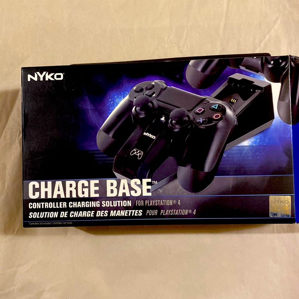 NWOT. Nyko charge base controller charging solution for ps4 brand new in box.
